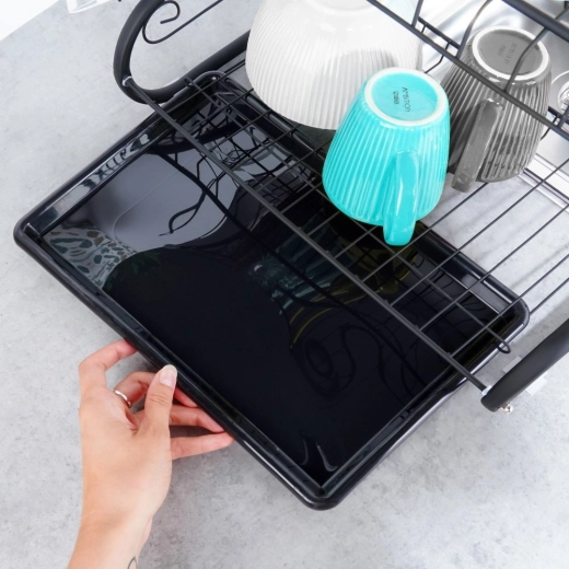 Išimamas lašėjimo padėklas