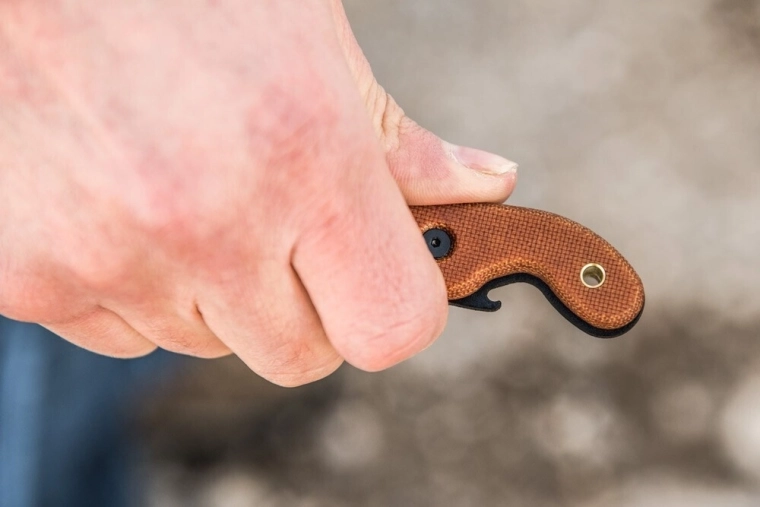 Practical micarta handle with opener