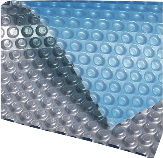 Blue-silver solar cover for a 3.6 m pool