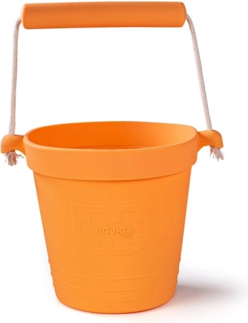 Oranžinis silikoninis paplūdimio kibirėlis BIGJIGS TOYS