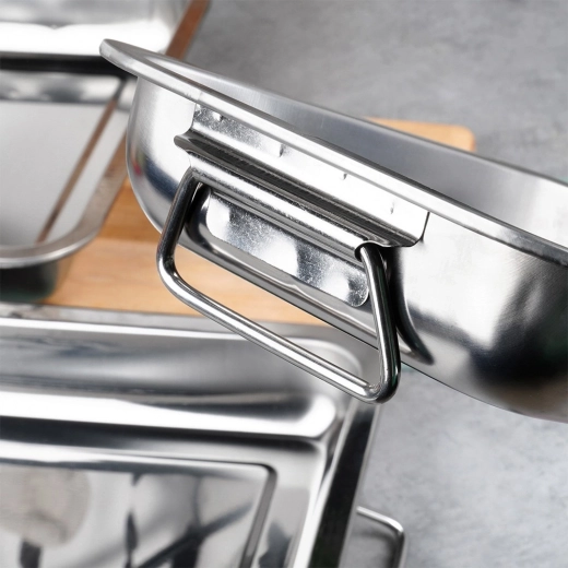 Sulankstomos rankenos saugiam nešimui