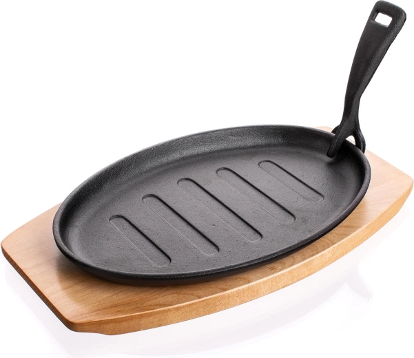 Cast iron pan 27 × 17.5 cm with wooden board Grada