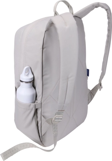 Side pockets for bottle and accessories