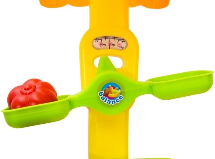 Movable scale for realistic play