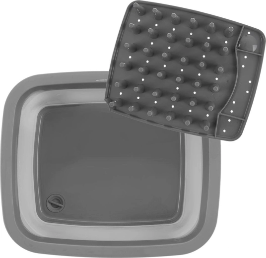 Drain with stopper and controlled release