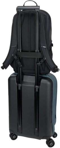Worry-free travel: pass-through strap for a suitcase