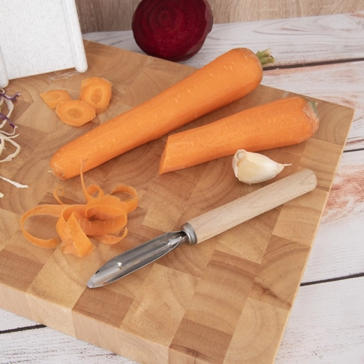 Durable metal blade for fast peeling