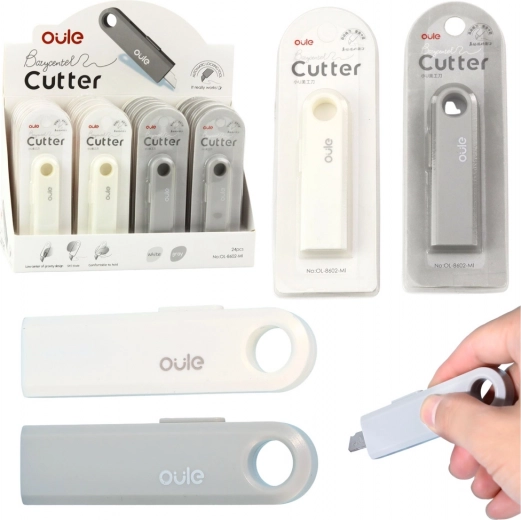 Mini retractable cutter for paper and film, compact