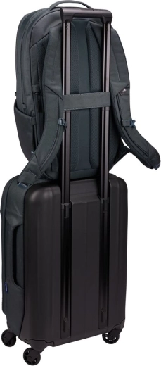 Comfortable carrying and attachment to a suitcase