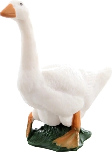 Plastic goose figurine on grass 6 × 7 cm