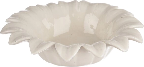 White ceramic flower-shaped candle holder
