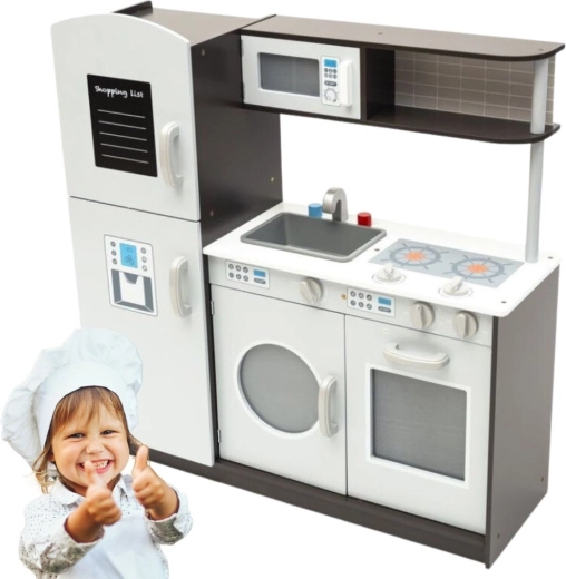 Wooden children's play kitchen in white with brown accents and a writing board