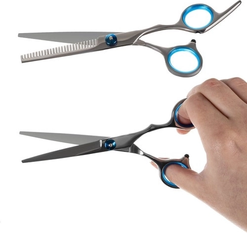 Dvi poros žirklių tiksliam kirpimui ir retinimui