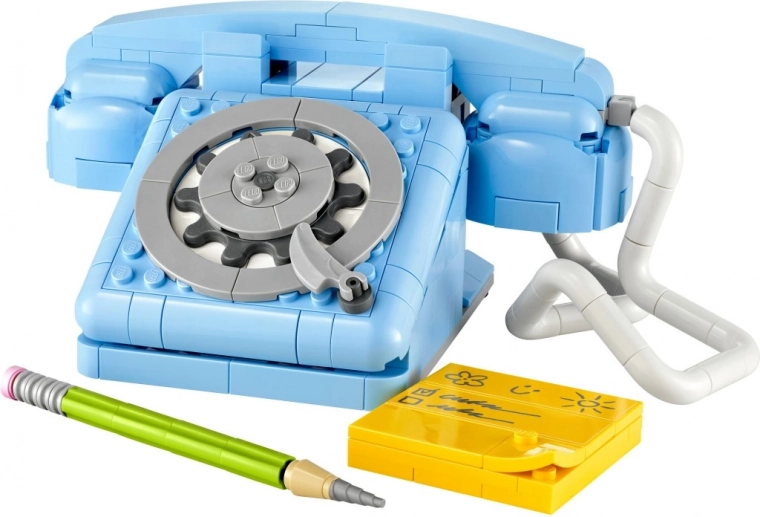 Autentiškas 7-ojo dešimtmečio telefonas su sukamąja rinkimo diskeliu