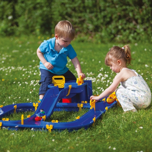 Learning through play: channels, sluice gates, and lock