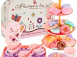Children’s tea set in a suitcase with cakes and pastries